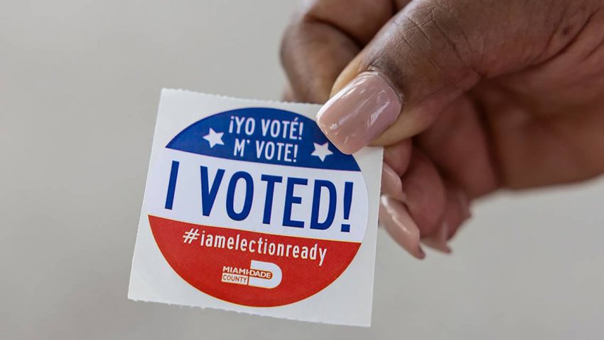 Rita OíShell holds her sticker after voting at the North Dade Regional Library during Election Day on Tuesday, Aug. 20, 2024, in Miami Gardens, Florida. (Matias J. Ocner/Miami Herald/Tribune News Service via Getty Images)