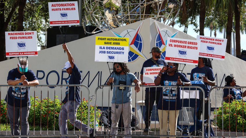 Port of Miami dockworkers strike near the port entrance and demand a new labor contract, on October 1, 2024 in Miami, Florida. Officials at 14 ports along the US East and Gulf Coasts were making last-minute preparations on September 30 for a likely labor strike that could drag on the US economy just ahead of a presidential election — despite last-minute talks. (Photo by Giorgio Viera / AFP) (Photo by GIORGIO VIERA/AFP via Getty Images)