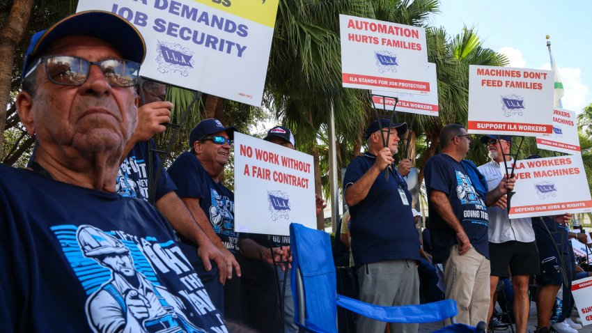 Port of Miami dockworkers strike near the port entrance and demand a new labor contract, on October 1, 2024 in Miami, Florida. Officials at 14 ports along the US East and Gulf Coasts were making last-minute preparations on September 30 for a likely labor strike that could drag on the US economy just ahead of a presidential election — despite last-minute talks. (Photo by Giorgio Viera / AFP) (Photo by GIORGIO VIERA/AFP via Getty Images)