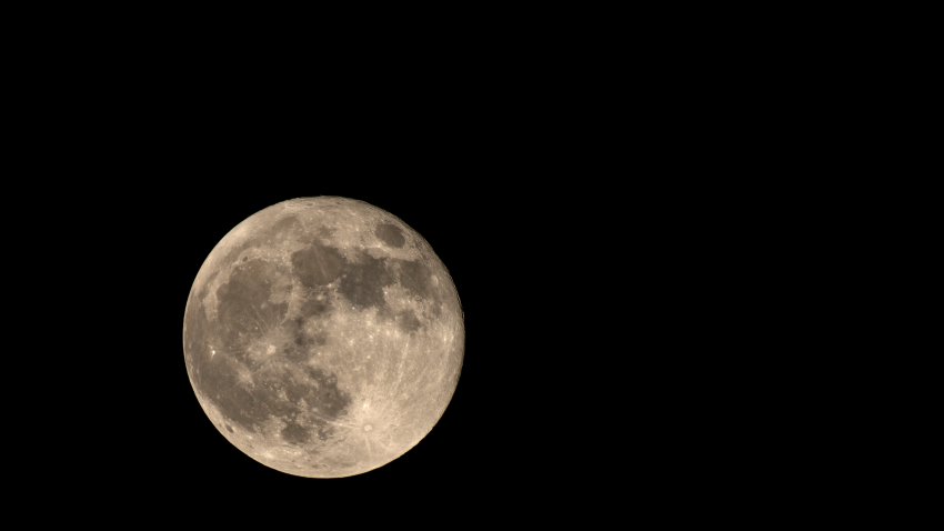 A stunning close-up shot of the full harvest moon captured in September 2024 from Kolkata, India, showcasing its bright, detailed lunar surface.