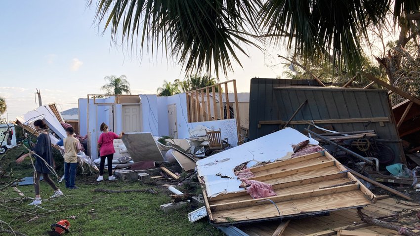 FORT PIERCE, FLORIDA, UNITED STATES – OCTOBER 12: People look at a mobile home destroyed by a tornado associated with Hurricane Milton on October 12, 2024 in the Lakewood Park community of Fort Pierce, Florida. The owner of the residence was home when the tornado hit and is hospitalized. (Photo by Paul Hennesy/Anadolu via Getty Images)