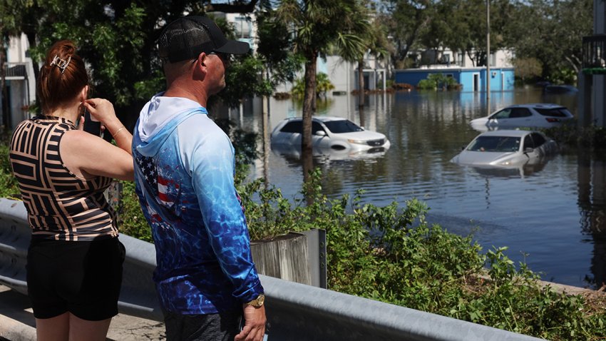 CLEARWATER, FLORIDA – OCTOBER 10: Cars are flooded in an apartment complex after the arrival of Hurricane Milton on October 10, 2024 in Clearwater, Florida. Milton, which comes just after the recent catastrophic Hurricane Helene,  landed into Florida’s Gulf Coast late Wednesday evening as a Category 3 storm causing extensive flooding and damage.  (Photo by Spencer Platt/Getty Images)