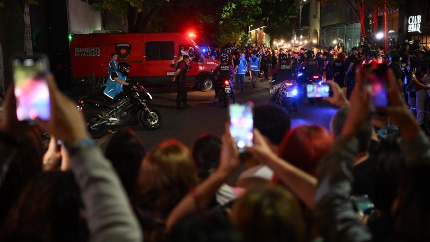 Forensic workers take the body of British singer Liam Payne on a fire van from the hotel where he died in Buenos Aires on October 16, 2024. British singer Liam Payne, former member of the group One Direction, died Wednesday aged 31 after falling from the third floor of a hotel in Argentina, police in Buenos Aires said.