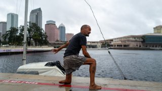 "Lieutenant Dan" talks to police trying to persuade him to leave his boat ahead of Hurricane Milton on Wednesday.