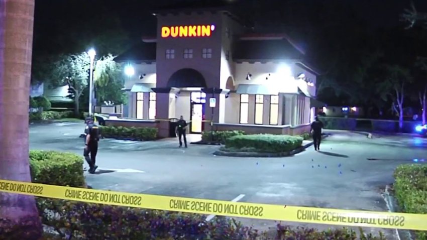 Miramar police said they responded to the investigation in the 6200 block of Miramar Parkway. Aerial images show several evidence markers outside a Dunkin’ Donuts location at that address.