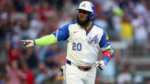 Aug 3, 2024; Atlanta, Georgia, USA; Atlanta Braves designated hitter Marcell Ozuna (20) reacts after a home run against the Miami Marlins in the third inning at Truist Park. Mandatory Credit: Brett Davis-USA TODAY Sports