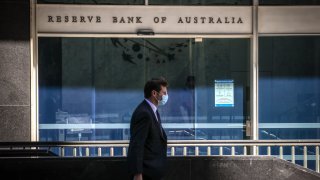 A pedestrian passes the Reserve Bank of Australia (RBA) building in Sydney, Australia, on Monday, Sept. 6, 2021.