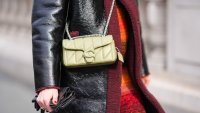 Close-up detail view of a green quilted leather bag from Coach, outside Coach, during New York Fashion Week, on February 12, 2024 in New York City. 