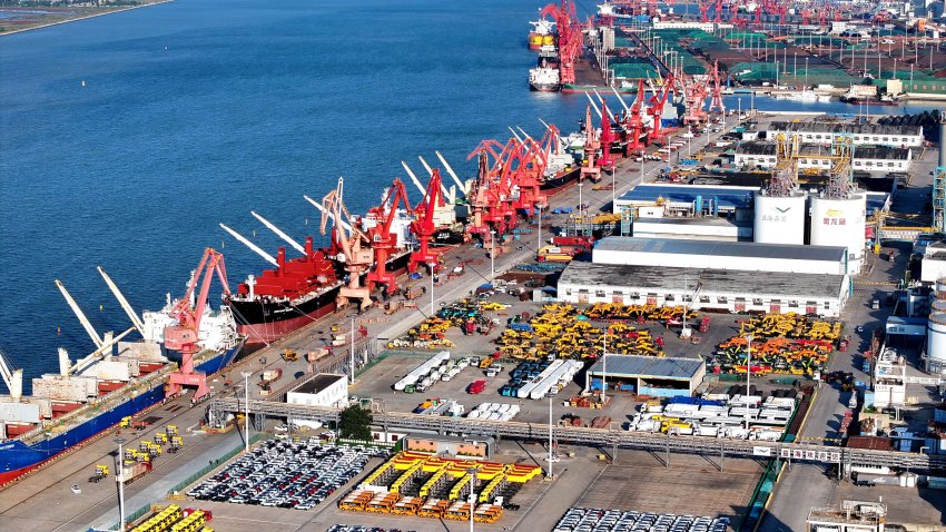 A large number of machinery and vehicles are ready for shipment at the dock of the Oriental Port Branch of Lianyungang Port in Lianyungang, China, on September 27, 2024. 