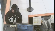 The FBI released a surveillance image of a suspect who robbed a Chase Bank in Miami on Nov. 9, 2024.