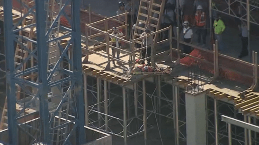 A worker was hospitalized after suffering a fall at a construction site in Bal Harbour Tuesday morning.