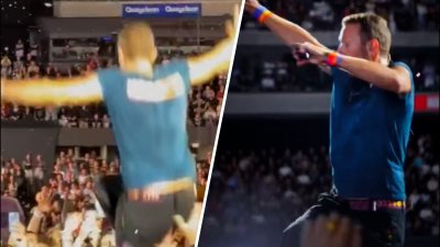 Coldplay frontman Chris Martin falls through trap door on stage