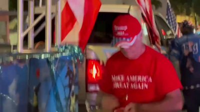 Truck for Harris gets heckled by Trump supporters outside Versailles on 8th Street