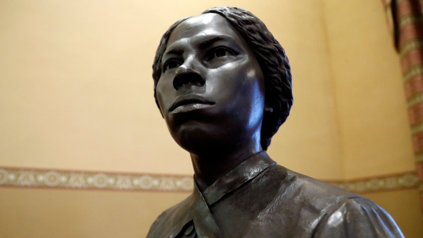 FILE – A bronze statue of abolitionist Harriet Tubman is seen at the Maryland State House, Feb. 10, 2020, in Annapolis, Md.