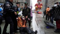 New York Police arrest Pro-Palestinian protesters who were demonstrating on Sixth Avenue during the Macy’s Thanksgiving Day Parade, Thursday, Nov. 28, 2024, in New York. (AP Photo/Julia Demaree Nikhinson)