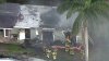 Firefighters battle house fire in Davie