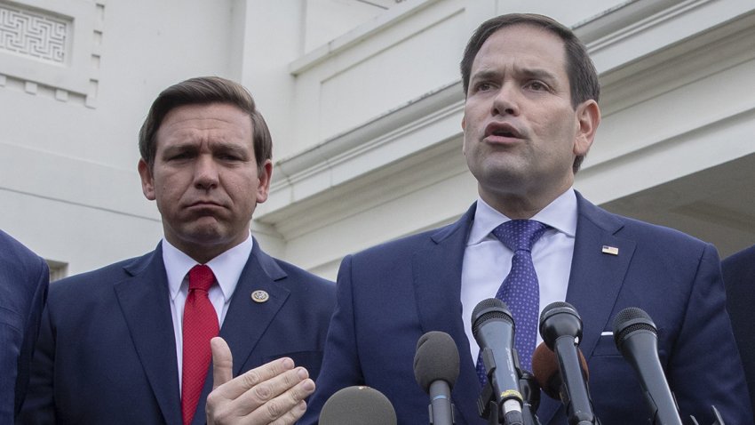 Senator Marco Rubio, a Republican from Florida, center, speaks while Representative Mario Diaz-Balart, a Republican from Florida, from Left, Ron DeSantis, governor of Florida, and Senator Rick Scott, a Republican from Florida, listen during a news conference outside the White House in Washington, D.C., U.S., on Tuesday, Jan. 22, 2019. Senate leaders have agreed to votes on rival proposals for reopening the government for the first time since the shutdown began last month, though its not clear either measure can pass. Photographer: Tasos Katopodis/Bloomberg via Getty Images 