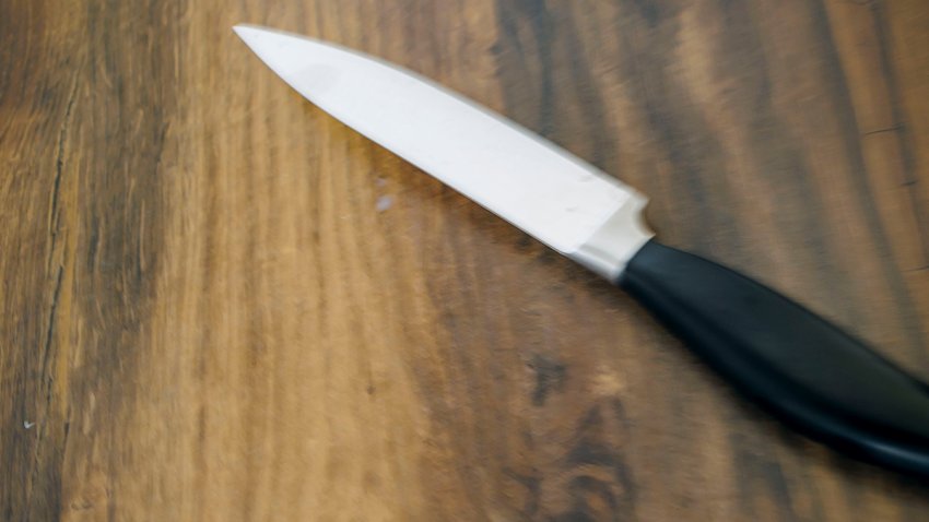 BERLIN, GERMANY – MAY 19: Symbolic photo on the topic of dangers in the household. A small child reaches for a knife in the kitchen at home on May 19, 2023 in Berlin, Germany. (Photo by Thomas Trutschel/Photothek via Getty Images)