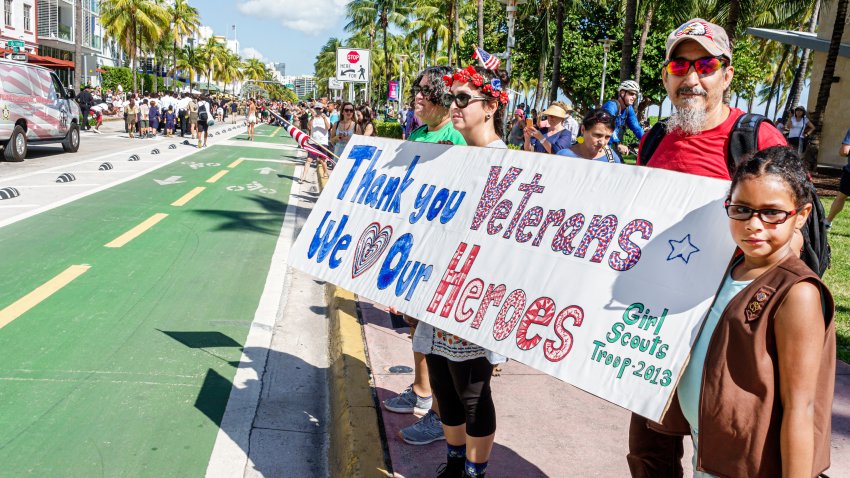 Miami Beach, Florida, Veterans Day Parade, Girl Scouts of America and Brownies holding a thank you veterans banner. (Photo by: Jeffrey Greenberg/Universal Images Group via Getty Images)