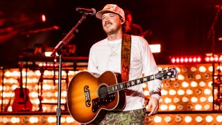 KNOXVILLE, TENNESSEE – SEPTEMBER 20: Morgan Wallen performs onstage for night one of his One Night At A Time tour at Neyland Stadium on September 20, 2024 in Knoxville, Tennessee. (Photo by John Shearer/Getty Images for Morgan Wallen’s One Night At A Time 2024)