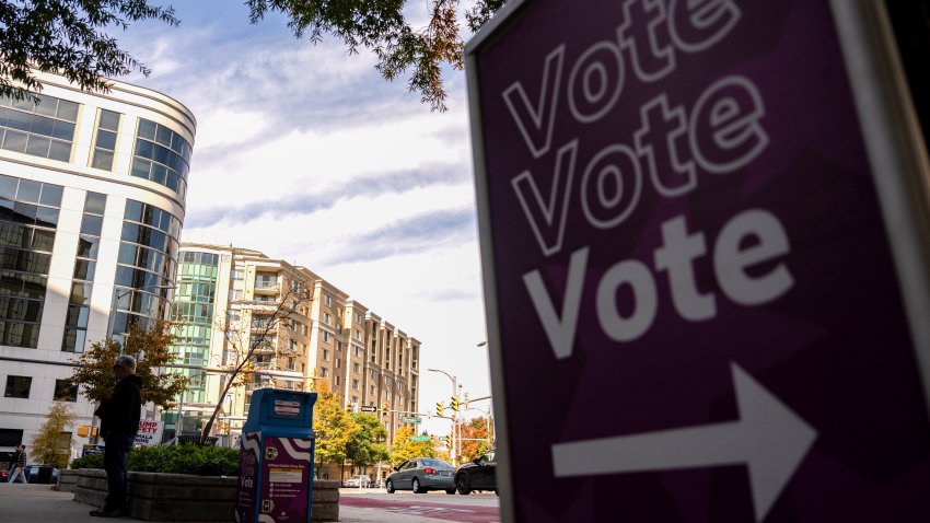 An official ballot drop box outside the Ellen M. Bozeman Government Center in Arlington, Virginia, US, on Saturday, Oct. 26, 2024. A federal judge in Virginia on Friday halted what she concluded was an unlawful, systematic purge of names from the state’s voter rolls ahead of the Nov. 5 presidential election, in a win for the Biden administration. Photographer: Kent Nishimura/Bloomberg via Getty Images