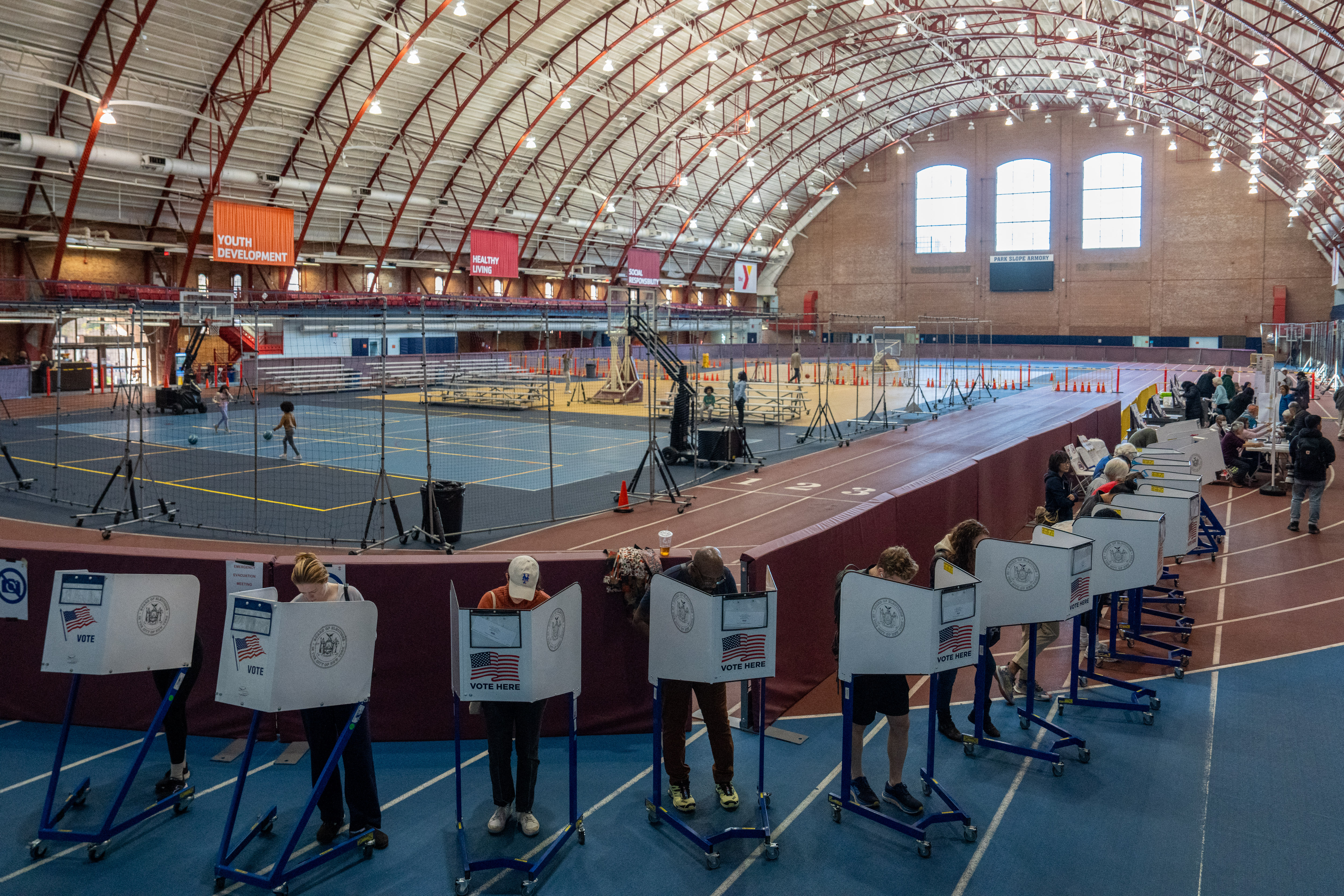 People vote at a polling station in the Brooklyn borough of New York City on Election Day, November 5, 2024.