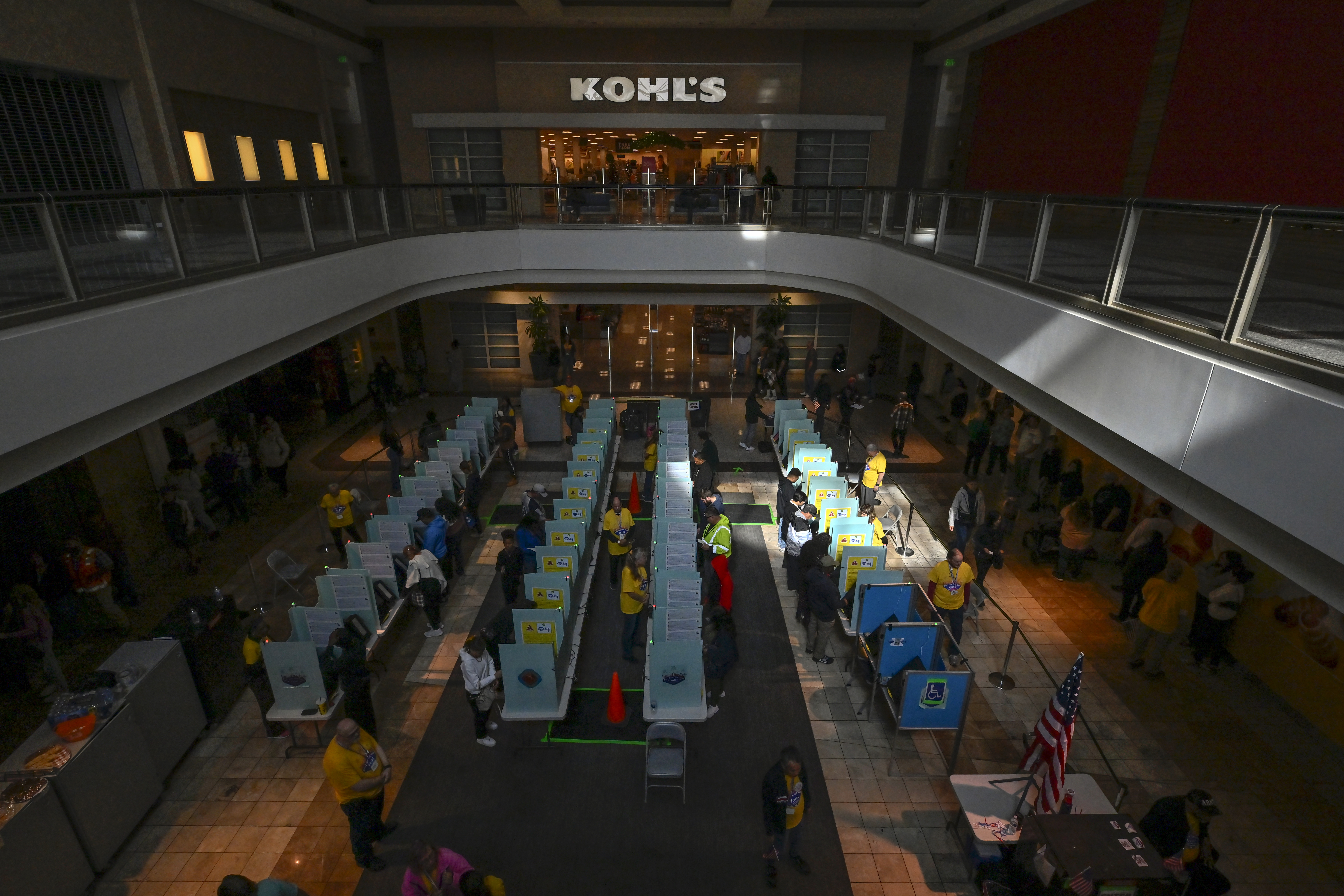 Voters cast their ballots at a polling station inside the Galleria at Sunset mall on November 05, 2024 in Las Vegas, Nevada.