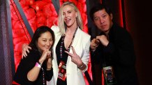 ARLINGTON, TEXAS - NOVEMBER 15: Charlize Theron (C) attends LIVE On Netflix: Jake Paul vs. Mike Tyson at AT&T Stadium on November 15, 2024 in Arlington, Texas. (Photo by Matt Winkelmeyer/Getty Images for Netflix © 2024)