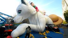 The  Extraordinary Noorah & The Elf on the Shelf by the Lumistella Company balloon is prepared during the Macy's Parade Balloon Inflation November 27, 2024. The annual Macy's Thanksgiving Day Parade in New York City started in 1924. The annual Macy's Thanksgiving Day Parade in New York City started in 1924. (Photo by TIMOTHY A. CLARY / AFP) (Photo by TIMOTHY A. CLARY/AFP via Getty Images)