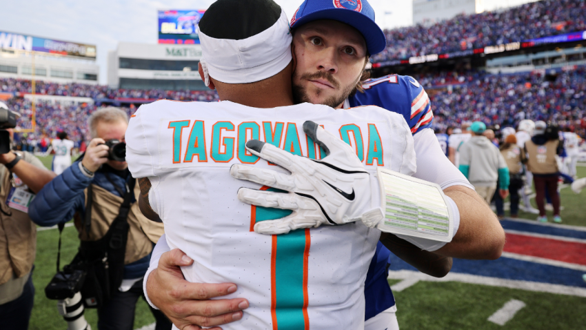 ORCHARD PARK, NEW YORK – NOVEMBER 03: Tua Tagovailoa #1 of the Miami Dolphins and Josh Allen #17 of the Buffalo Bills embrace on the field after their game at Highmark Stadium on November 03, 2024 in Orchard Park, New York.