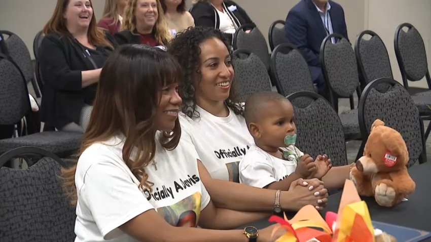 Meshawn and Sayesha Davis adopt 19-month-old Jonathan Davis in San Bernardino County on Wednesday, Nov. 13, 2024.