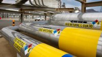 A network of insulated pipes carry liquefied natural gas from ships to giant storage tanks at Sempra Energy’s Costa Azul terminal north of Ensenada, Mexico.