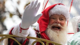 Santa Claus waves to the crowds during the Annual Thanksgiving Day Parade on November 28, 2024 in New York City. 