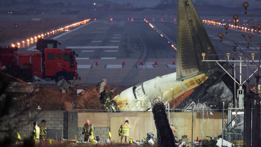 The wreckage of the Jeju Air aircraft that went off the runway and crashed lies at Muan International Airport, in Muan, South Korea, December 30, 2024. 