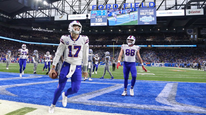 Josh Allen (17) runs into the end zone