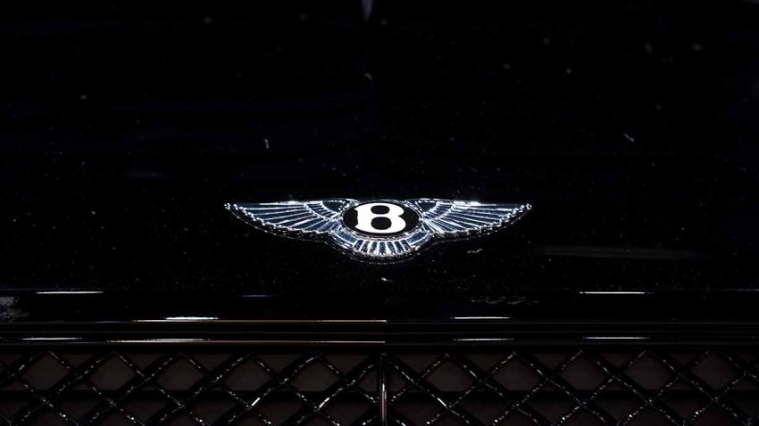 A badge on a Bentley Bentayga luxury car during the Chicago Auto Show in Chicago, Illinois, U.S., on Thursday, July 15, 2021. The Chicago Auto Show marks not only the resumption of the largest U.S. auto show, but also heralds the return of those crowded industry conventions, and the tourist and tax dollars they bring. Photographer: Christopher Dilts/Bloomberg via Getty Images