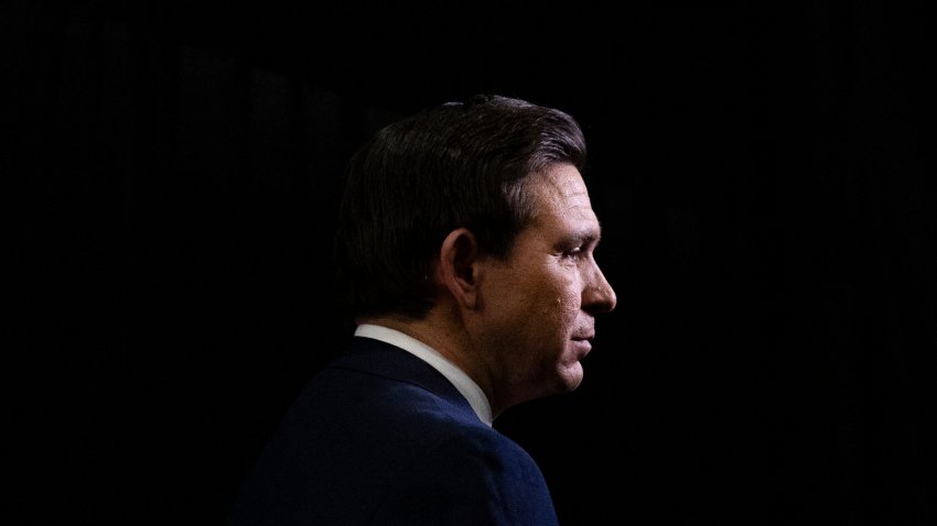 TOPSHOT – Florida Governor Ron DeSantis speaks to the media in the spin room after the fifth Republican presidential primary debate at Drake University in Des Moines, Iowa, on January 10, 2024. (Photo by Christian MONTERROSA / AFP) (Photo by CHRISTIAN MONTERROSA/AFP via Getty Images)