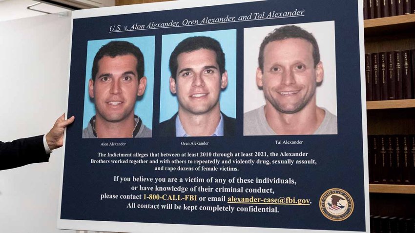 A display showing images of Alon, Oren, and Tal Alexander prior to a news conference in New York, US, on Wednesday, Dec. 11, 2024. Luxury real estate brokers Oren and Tal Alexander and their brother Alon were arrested and charged with sex-trafficking by federal prosecutors in New York on Wednesday. Photographer: Yuki Iwamura/Bloomberg via Getty Images