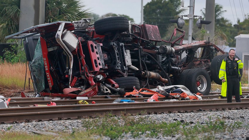 A Brightline train collided with a fire truck at East Atlantic Avenue and Southeast First Avenue in downtown Delray Beach, Florida, on Saturday, Dec. 28, 2024. (Mike Stocker/South Florida Sun Sentinel/Tribune News Service via Getty Images)