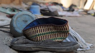 A hat and a shoe of a boy in Nigeria.