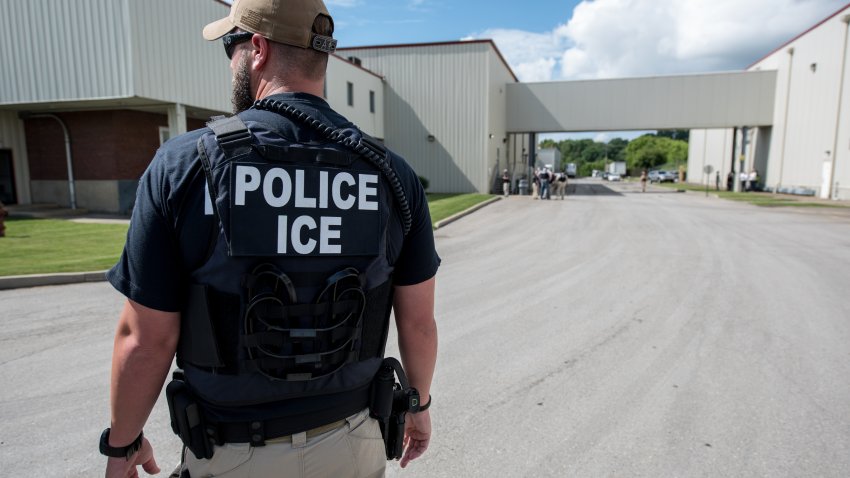 US Immigration and Customs Enforcement’s (ICE) special agent preparing to arrest alleged immigration violators at Fresh Mark, Salem, June 19, 2018. Image courtesy ICE ICE / U.S. Immigration and Customs Enforcement.