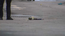 A possible Molotov cocktail is seen on the ground after a fatal police shooting in Fort Lauderdale on Jan. 9, 2025.