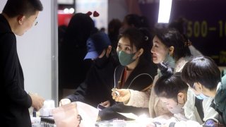 BEIJING, CHINA – FEBRUARY 22: Visitors purchase cosmetics during China International Beauty Expo (CIBE) Beijing 2023 at China National Convention Center on February 22, 2023 in Beijing, China. (Photo by Zhang Yu/China News Service/VCG via Getty Images)