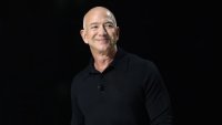 Jeff Bezos, founder and executive chairman of Amazon and owner of the Washington Post, takes the stage during the New York Times annual DealBook summit at Jazz at Lincoln Center on December 04, 2024 in New York City. 