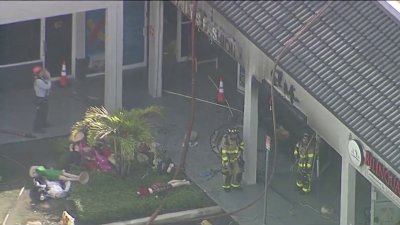 Person hospitalized after fire breaks out at shopping plaza in SW Miami-Dade