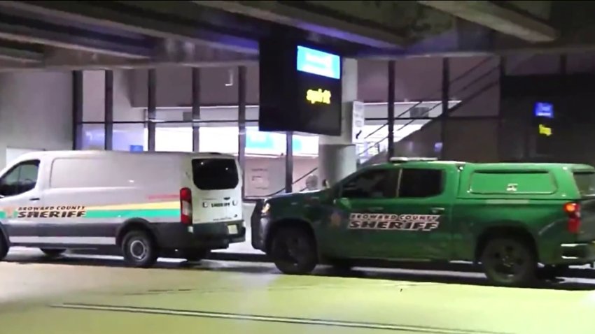 911 calls after 2 men found dead in landing gear at FLL released