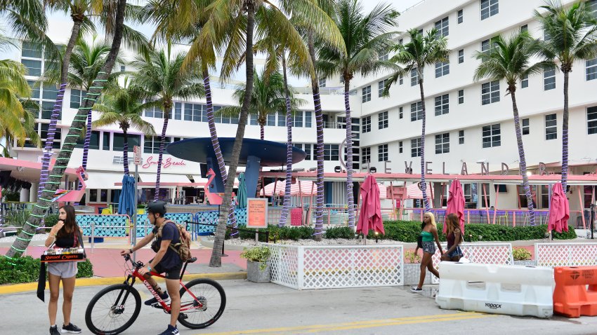 MIAMI BEACH, FLORIDA – JULY 15: People walk past the Clevelander South Beach Hotel on Ocean Drive July 15, 2020 in Miami Beach, Florida.  The Clevelander announced it was closing again until further notice due to growing concerns about the Covid-19 pandemic in Miami-Dade County. On Wednesday, Florida reported 112 deaths during a 24-hour period to surpass 300,000 cases. Local leaders in Florida are scrambling to contain the recent spike of the coronavirus. (Photo by Johnny Louis/Getty Images)