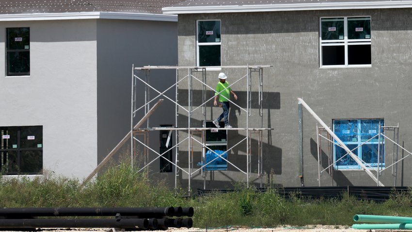 MIAMI, FLORIDA – SEPTEMBER 22: A worker helps build a new home on September 22, 2023 in Miami, Florida. With high borrowing costs, people are reluctant to sell, creating a reported nationwide shortage of houses for sale. (Photo by Joe Raedle/Getty Images)