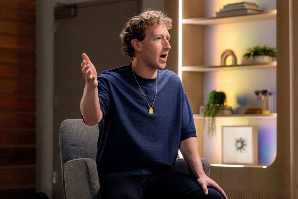 What is on Mark Zuckerberg's gold chain necklace?