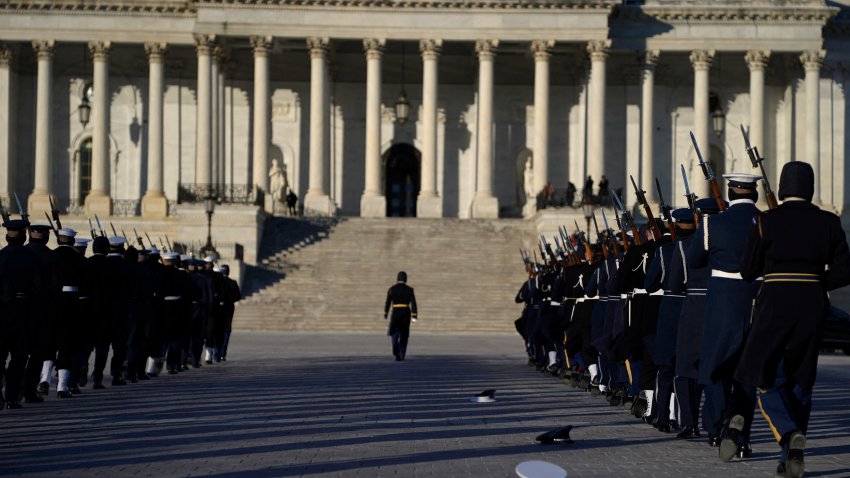 An Honor Guard prepares for the departure of the remains of former US President Jimmy Carter from the US Capitol for the State Funeral Service at the Washington National Cathedral in Washington, DC, on January 9, 2025. (Photo by KENT NISHIMURA/AFP via Getty Images)